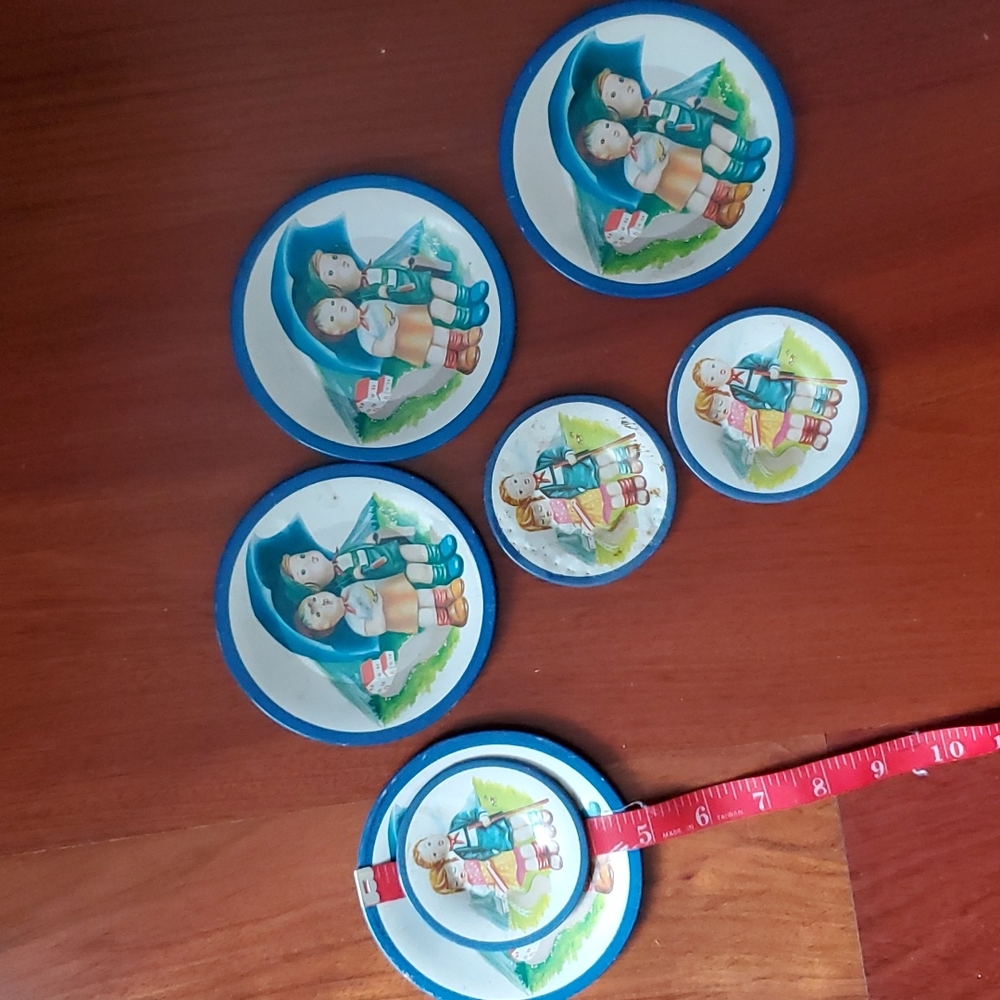 Vintage Hummel children under umbrella toy Tea Set plates 7 tin plates.